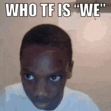 a young boy is making a funny face with the words `` who tf is we '' written above him .