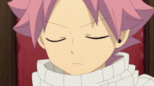 a close up of a person 's face with pink hair