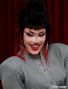 a close up of a woman 's face with t4yce tumblr in the bottom right corner