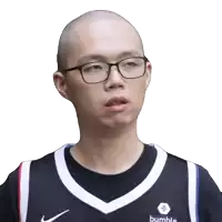 a bald man wearing glasses and a bumble basketball jersey