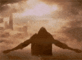 a man with his arms outstretched is flying through the air .