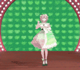 a girl in a green and white dress stands in front of a green background with hearts on it