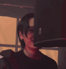 a man wearing a helmet with a square on it