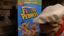a box of post marshmallow fruity pebbles cereal with a chef hat on