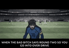 a soccer player is standing on a soccer field in front of a crowd and a stadium .