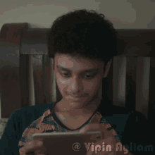 Joji Fahad Fazil GIF - Joji Fahad Fazil Watching Phone GIFs