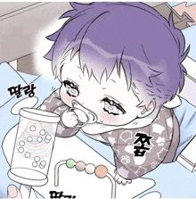 a baby with purple hair is drinking from a bottle with chinese writing on the back