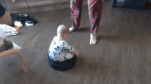 Baby Roomba GIF - Riding Dirty Baby GIFs