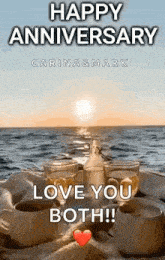 a happy anniversary greeting card with a sunset in the background .
