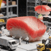a large piece of sushi is being served to a group of people .