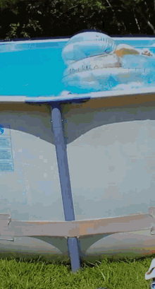 a swimming pool with the word intex written on the side
