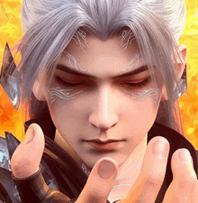 a close up of a person 's face with their eyes closed and their fingers on their face .
