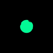 a green circle on a black background that looks like a teardrop