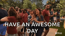 a group of people are dancing in a park with the words `` have an awesome day '' above them .