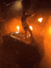 a blurry photo of a man standing on a stage