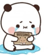 a cartoon panda bear is crying while holding a sign that says `` missing '' .