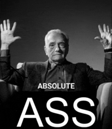 a black and white photo of an elderly man with his hands in the air and the words absolute ass above him
