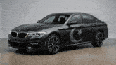 a bmw with a crescent moon and star on the side