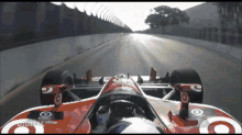 a red and white race car with the word target on the front