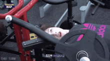 a woman laying on a machine with the words treasure map written on the bottom