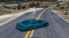 a blue car is driving down a road with the words do not enter visible