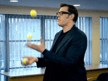 Juggling Richard Osman GIF - Juggling Richard Osman Taskmaster GIFs