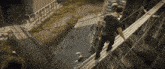 a man in a black shirt is walking on a tightrope