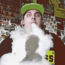 a man in a green hat is blowing smoke out of his mouth while wearing a yellow shirt with the letter s on it