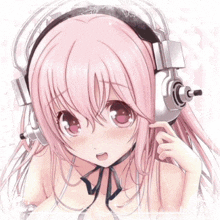 a girl with pink hair wearing headphones and a bow around her neck