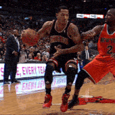a basketball player in a chicago jersey is dribbling the ball