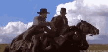 Cowboys Riding Horses GIF - Cowboys Riding Horses Handshake GIFs