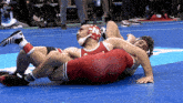 a wrestler with the letter n on his head