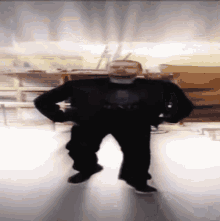 a man wearing a mask and a sweater that says king is dancing