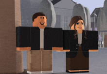 a man and a woman standing next to each other