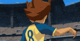 a boy with the number 8 on his jersey