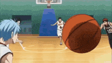 a basketball player wearing a number 16 jersey dribbles the ball