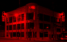 a building with a red sign that says ccc