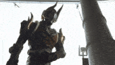 a knight with horns is standing in front of a pole
