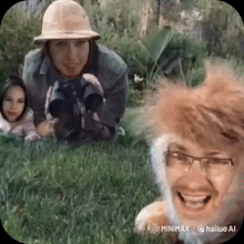 a man and a woman are laying in the grass .