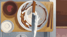 a drawing of a dirty plate with a knife on it