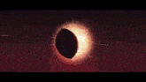 the sun is shining through a circle in the middle of a tunnel