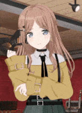 a girl with long brown hair and blue eyes is wearing a yellow shirt and tie