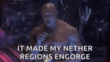 a man with a tattoo on his chest is smoking a cigarette and says `` it made my nether regions encourage '' .