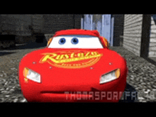 lightning mcqueen from the movie cars is driving down a street