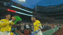 a baseball player wearing a yellow jersey with the word union on the sleeve