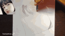 a drawing of a woman 's face is being drawn on a piece of paper with the words youcandraw below it