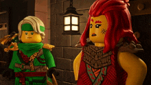 two lego figures are standing next to each other and one of them has a tattoo on her face