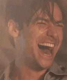 Aidan Turner Laugh GIF