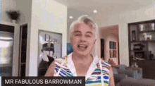mr fabulous barrowman is talking on a video call in a living room .