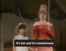 a woman in a red dress holding a stick with the words it 's hot and it 's monotonous on the bottom